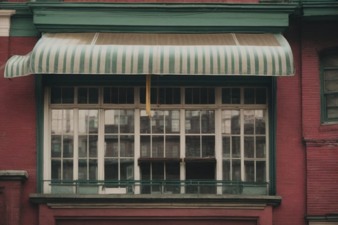 Historic Boston building with faded window film and vibrant interior